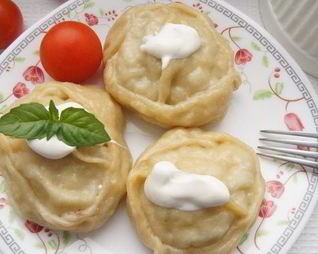 Манты со свининой и картофелем