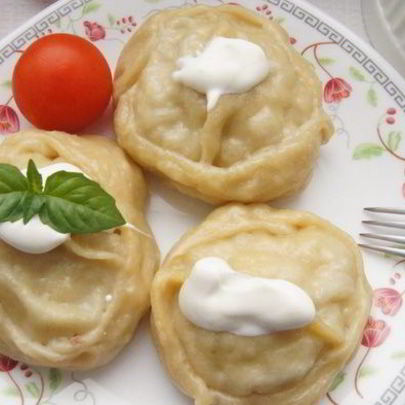 Манты со свининой и картофелем