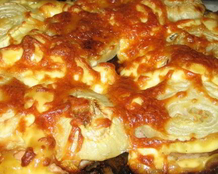 Свинина по-французски с сыром и луком