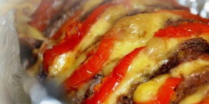Рецепт мяса, запеченного с сыром и помидорами