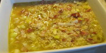 запеченное в духовке ризотто с луком-пореем и панчеттой