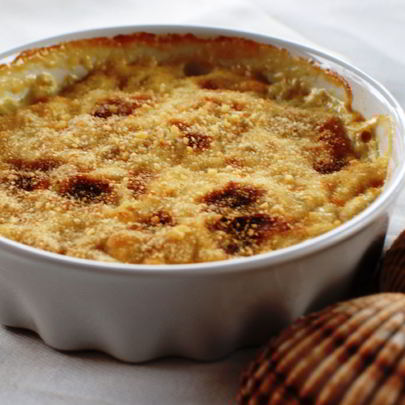 Гребешки и тигровые креветки в соусе бешамель