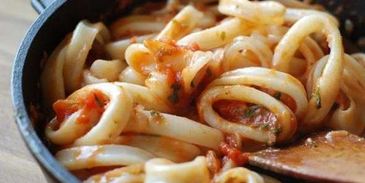 кальмары в томатном соусе