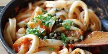 кальмары в томатном соусе