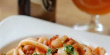 кальмары в томатном соусе