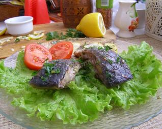 Речная рыба в мультиварке с лимонами на пару