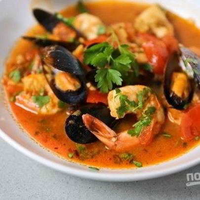 Жаркое с рыбой и морепродуктами в томатном соусе