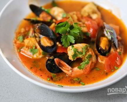 Жаркое с рыбой и морепродуктами в томатном соусе