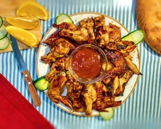 Куриные крылышки с медом солодом и Ткемали