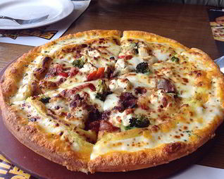 Пицца Деликатесная